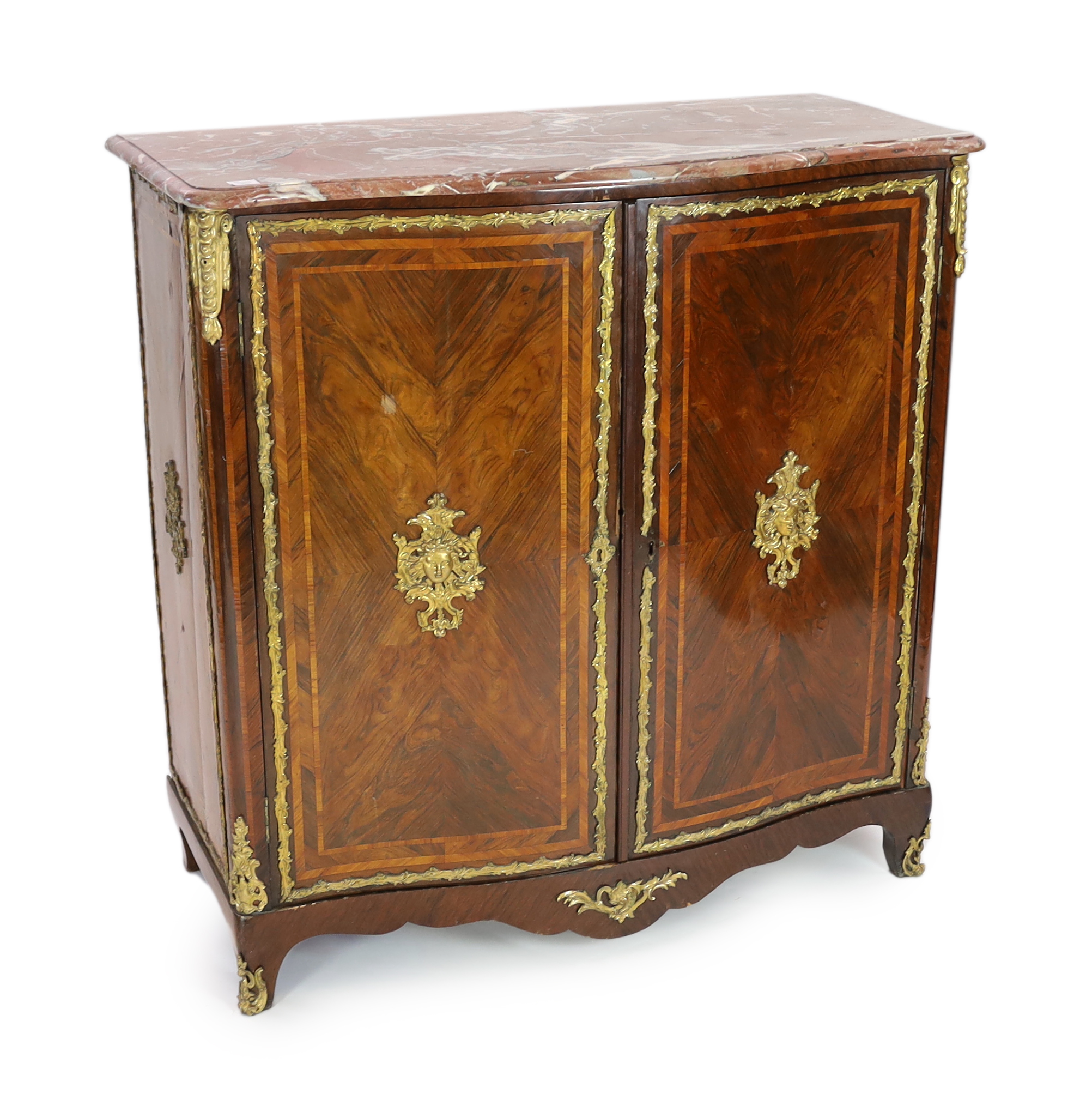 A Louis XV ormolu mounted rosewood and tulipwood Meuble d’Appui, 130cm wide, 63cm deep, 132cm high, Please note this lot attracts an additional import tax of 5% on the hammer price